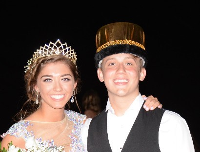 boy and girl wearing crowns